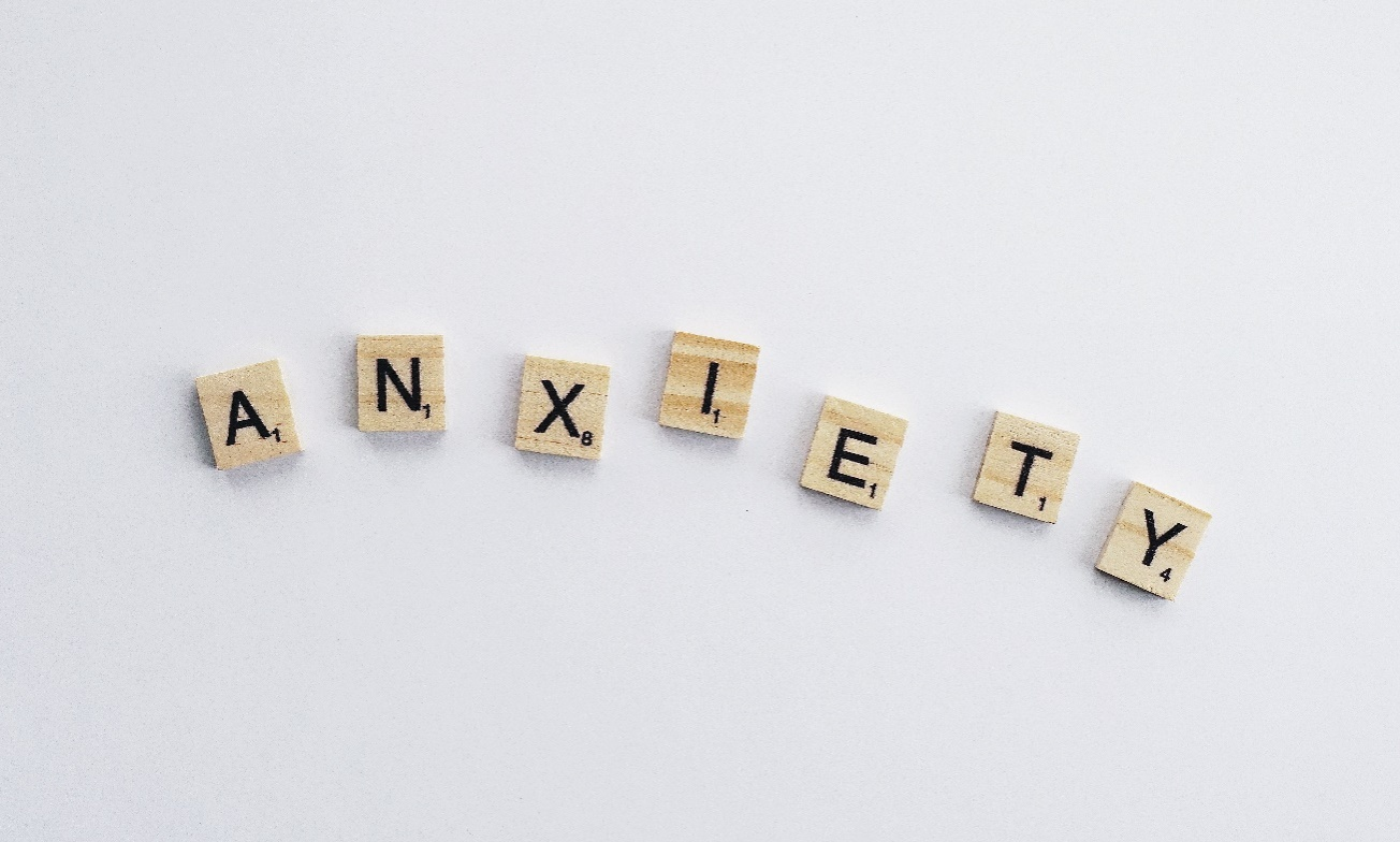 Wooden letter blocks spelling out anxiety