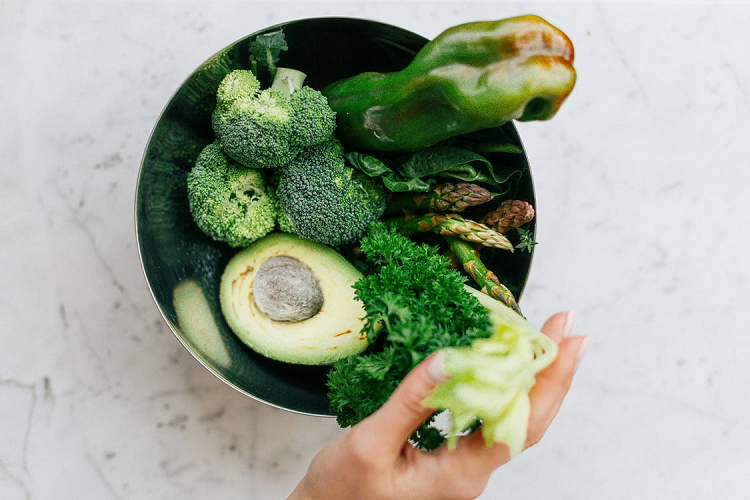 assorted green vegetables in a bowl