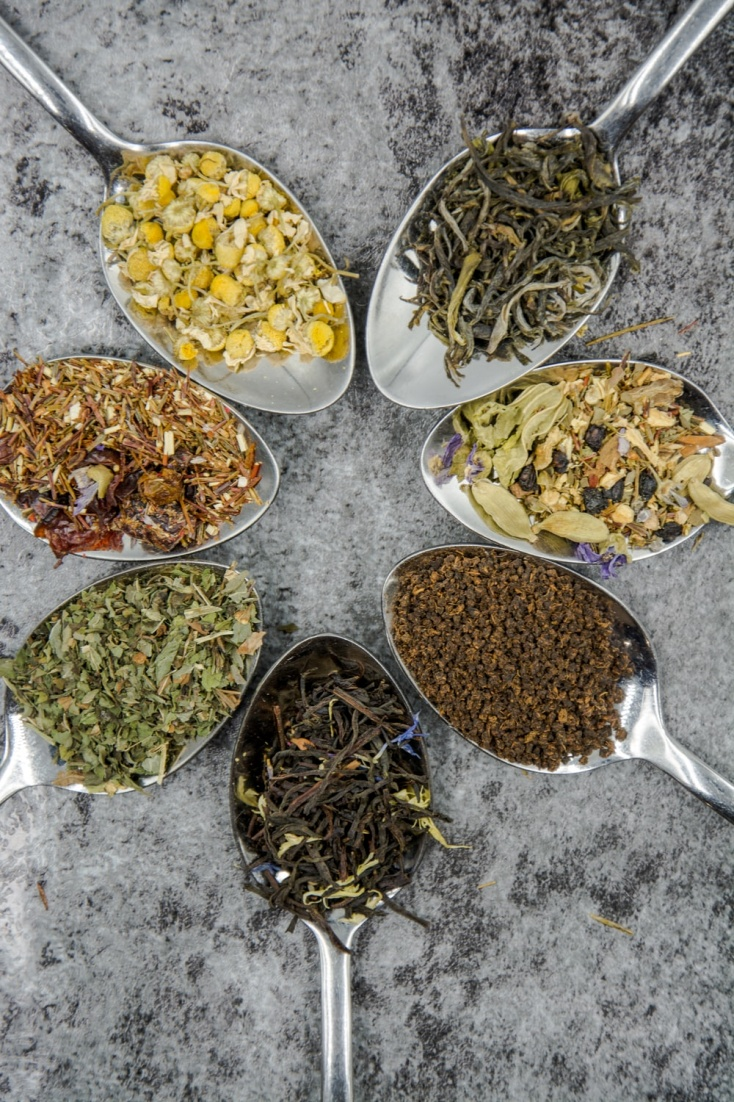  Different types of herbal teas in spoons